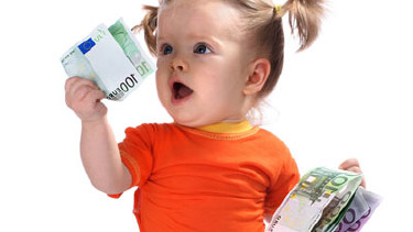 Baby mit Geldscheinen © Gennadiy Poznyakov, Fotolia.com