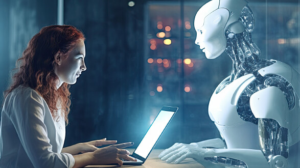 Künstliche Intelligenz: Frau mit Laptop sitzt Roboter gegenüber © mindscapephotos, stock.adobe.com KI am Arbeitsplatz